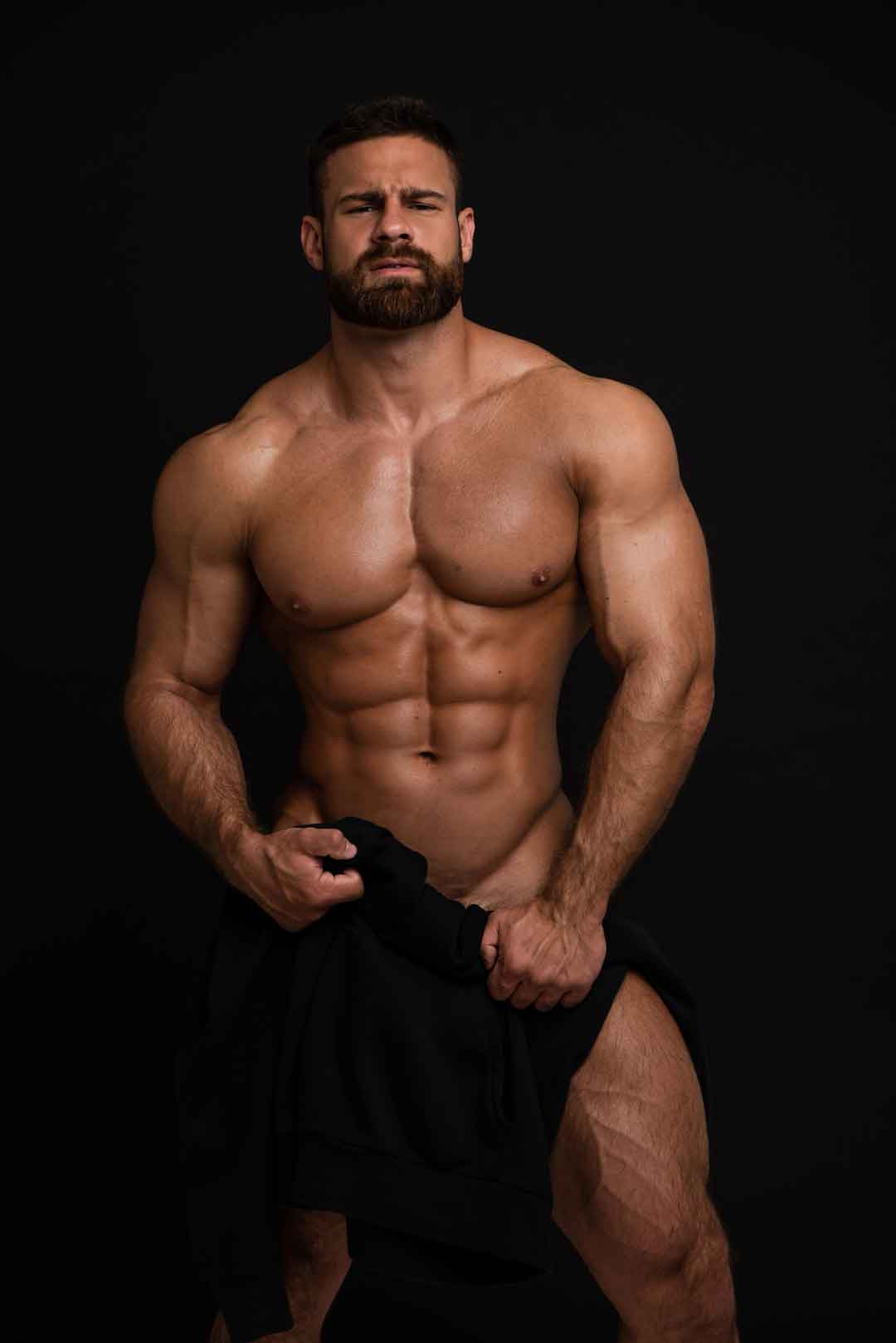 an image of a partially dressed exotic male dancer in Denver