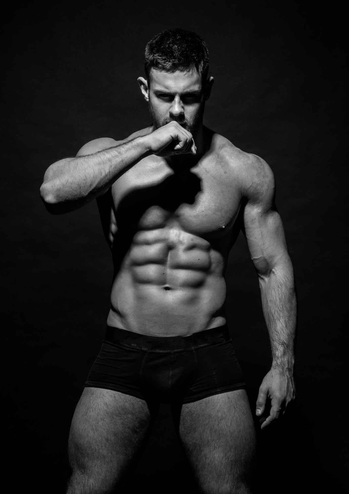 a black and white image of an exotic male dancer in Denver